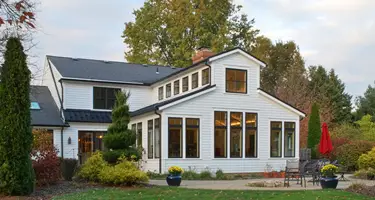 Exterior view of the house showing the front barn like part of the house