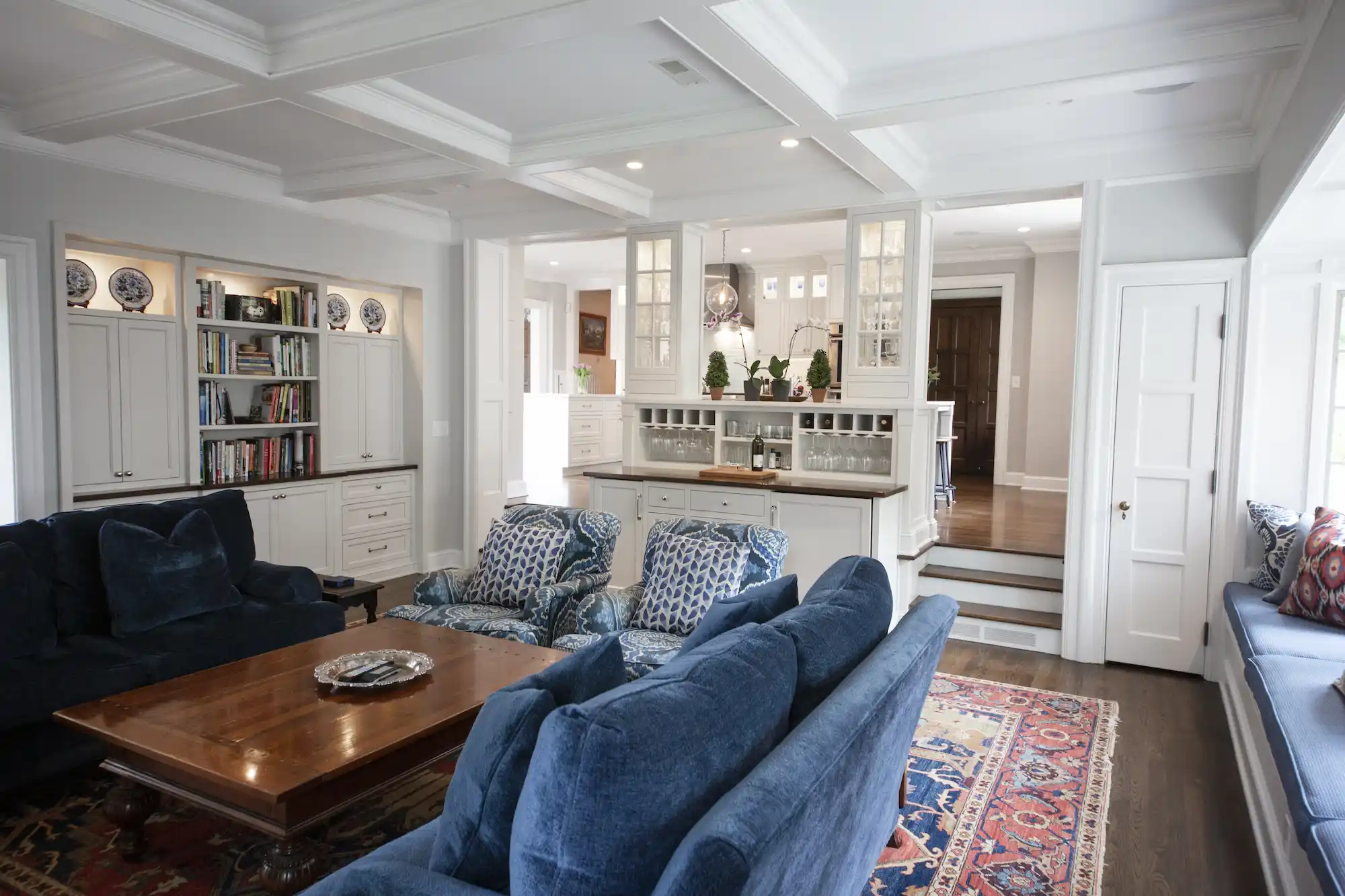 View from the far side of the living room showing how the house steps up into the kitchen
