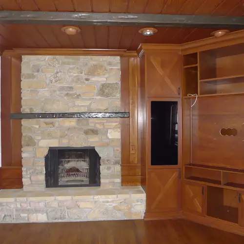 Existing fireplace and entertainment center